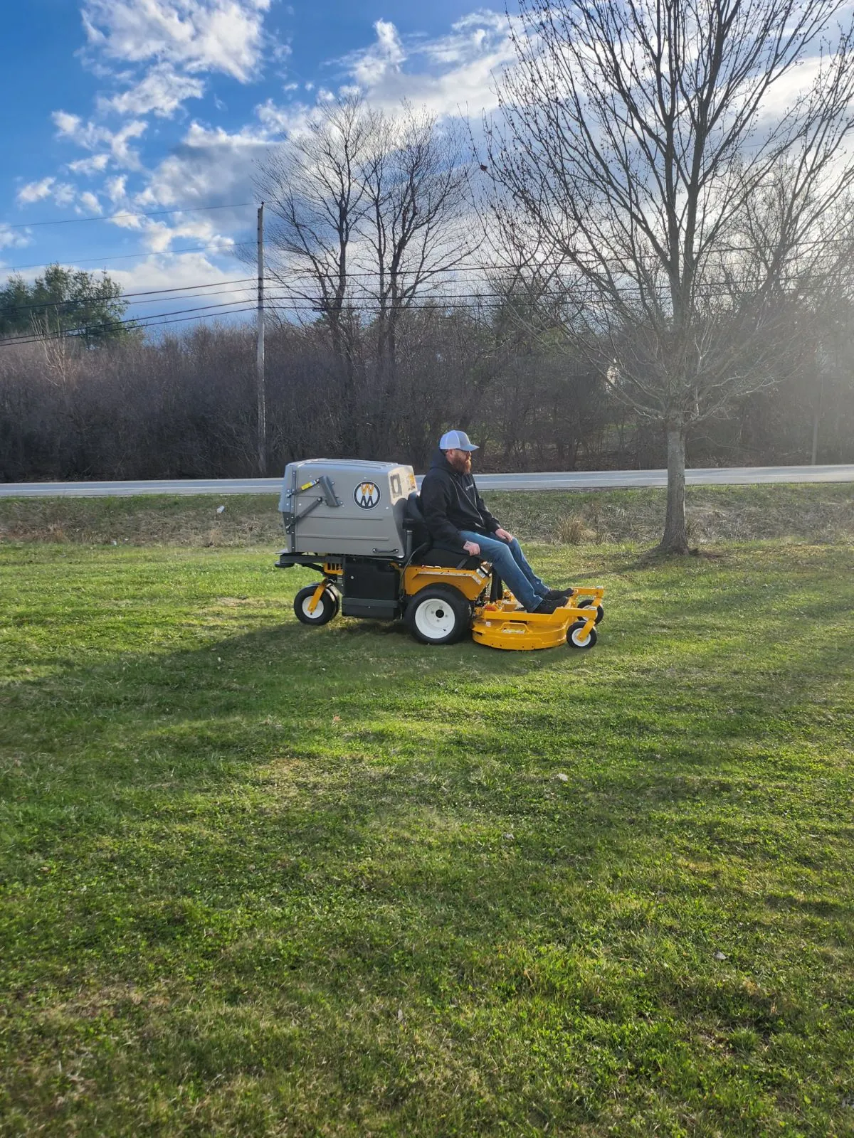 Owner Herb Johnson running a mower